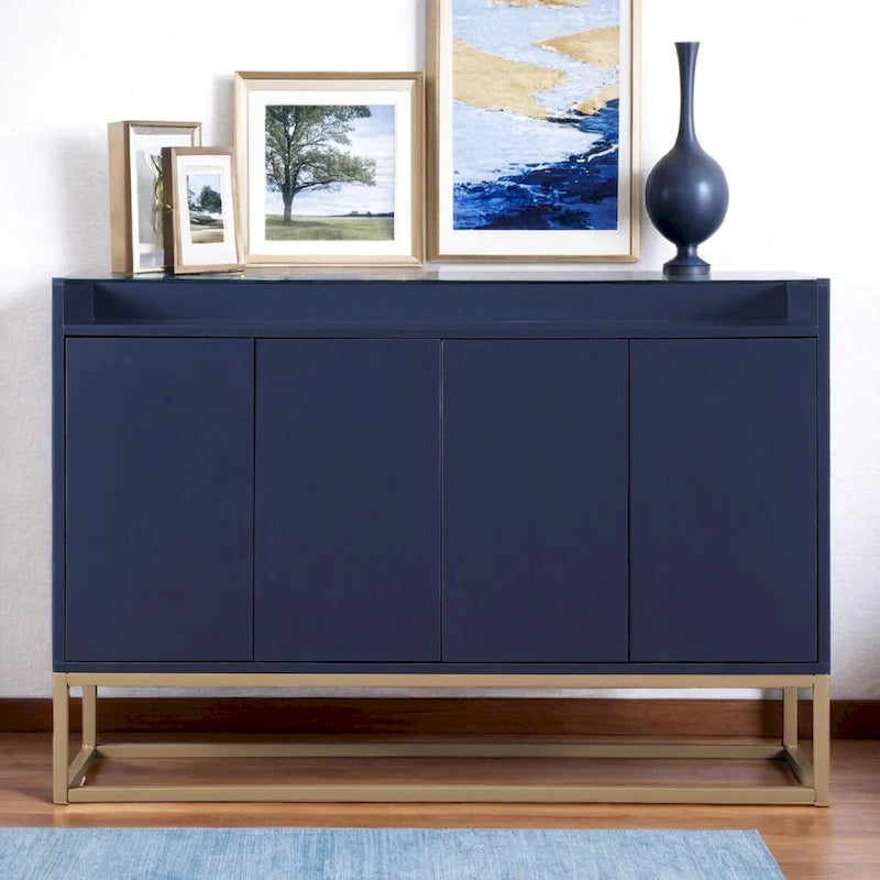 Buffet de 119 cm avec pieds dorés, système d'ouverture par pression, barrière de protection sur le plateau et 4 portes sans poignée